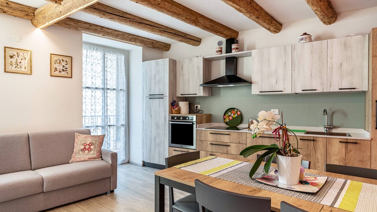 Levico Terme Apartment | Holiday Apartment 'L'Antica Corte Apt Angelina' with Mountain View, Balcony & Wi-Fi