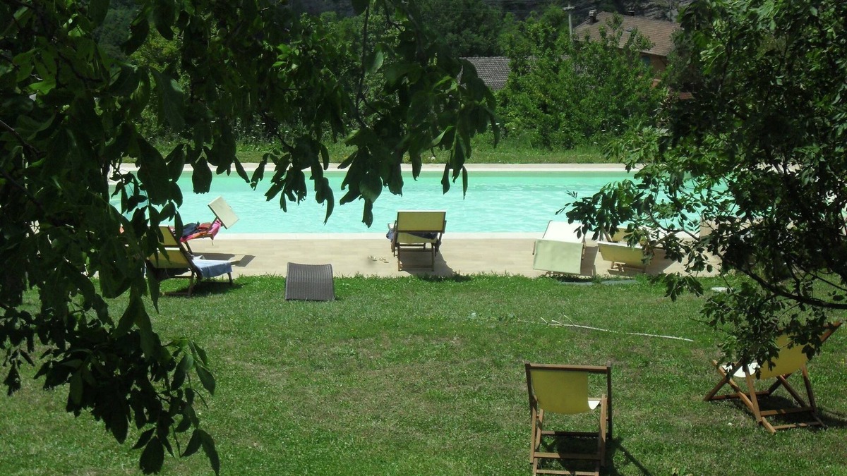 Lizzano in Belvedere House | Holiday Home in Imola with Forest & Pool