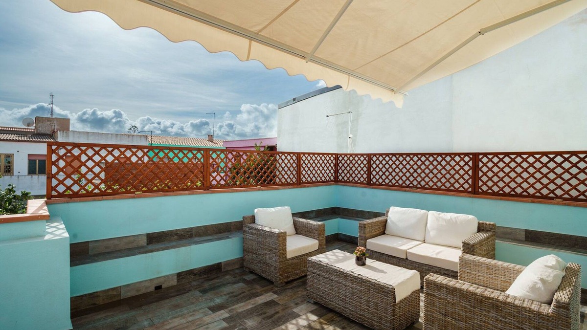 Portoscuso Apartment | Holiday Home Alle Pavoncelle, independent with terrace of 50 sqm
