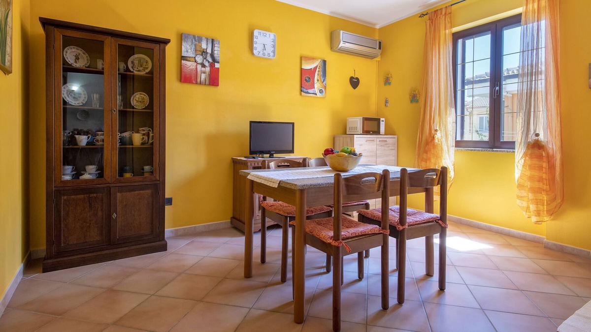 Sennori House | Holiday Home 'Appartamento Buena Vista' with Sea View, Shared Terrace and Air Conditioning