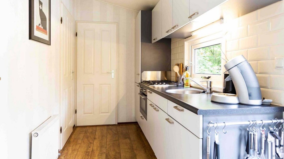 Veen Ski Chalet | ✓ Holiday Home at Recreatiepark het Esmeer ✓ Holiday home for 4 persons✓ Located in Aalst (Gelderland) ✓ Holiday park by the water ✓ Book directly at the park