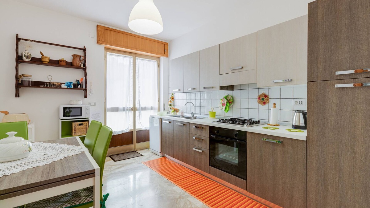 Magomadas House | Holiday Home 'Casa Sole Luna Magomadas' with Private Garden, Balcony and Wi-Fi