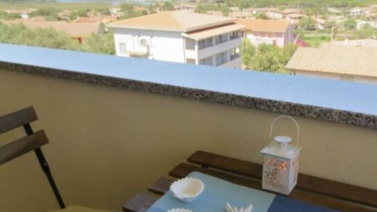 Iscra e Voes House | Holiday Home 'Casa Vacanza Sa Petra Ruja B' with Sea View, Balcony and Air Conditioning