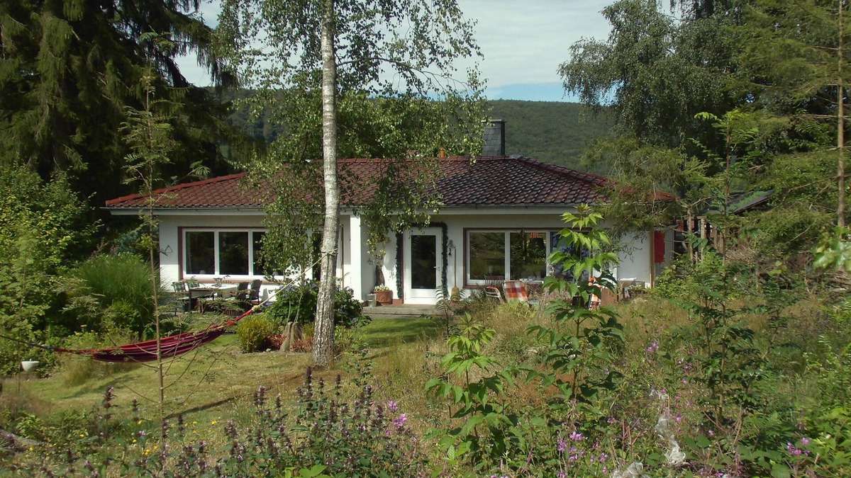 Bodenfelde House | Holiday home complex Hilkenberg: House 3 with fireplace and. wild and romantic garden