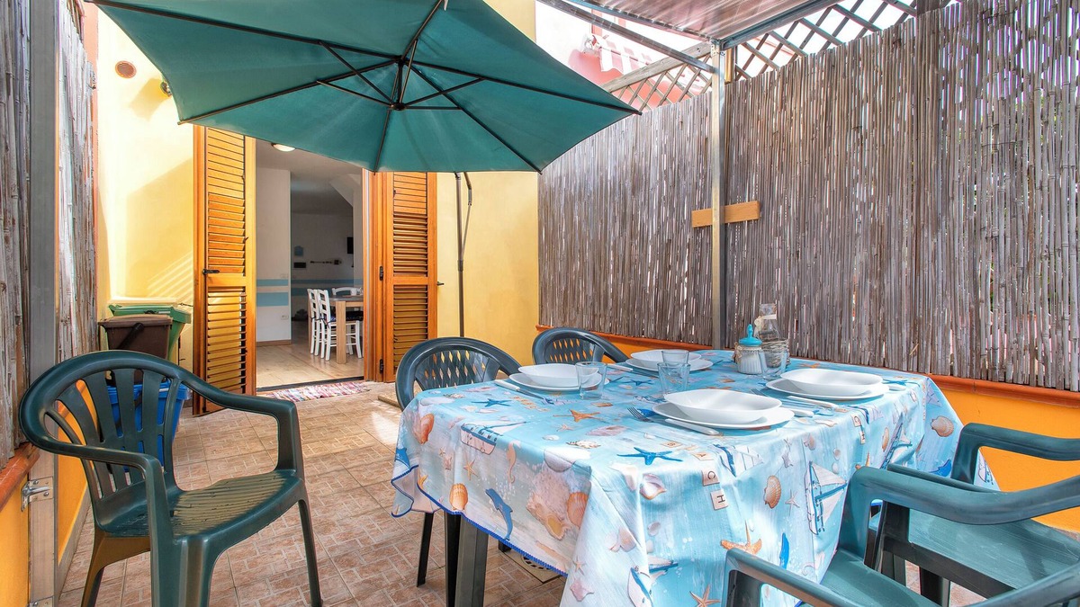 Stintino House | Holiday Home 'Holiday Cala Sant'andrea' with Shared Terrace, Balcony and Wi-Fi