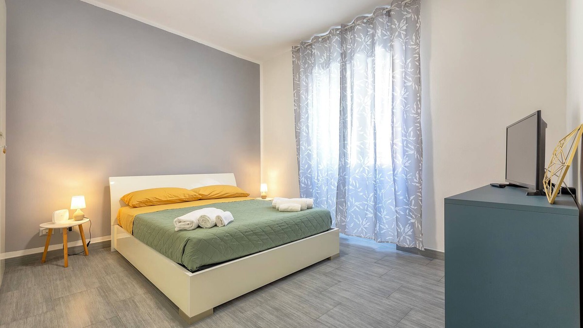 Porto Torres House | Holiday Home 'Oikos 58' with Private Terrace, Wi-Fi and Air Conditioning