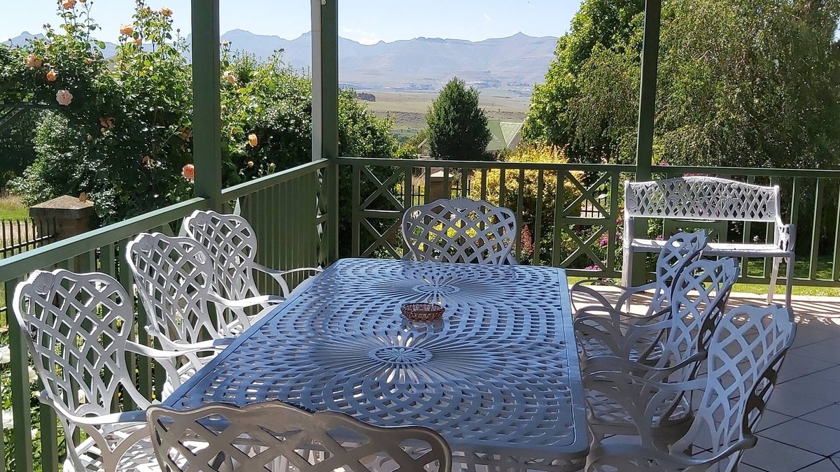 Clarens House | Holiday house priced per bedroom - 4, fenced garden, great views, walk to town