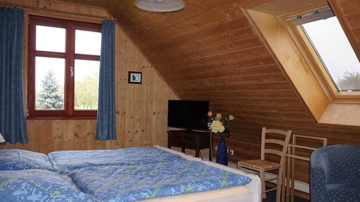 Hinrichshagen Apartment | Holz 100 Haus EZ Süd - Guesthouses Eva-Maria and Reinhard Köhler