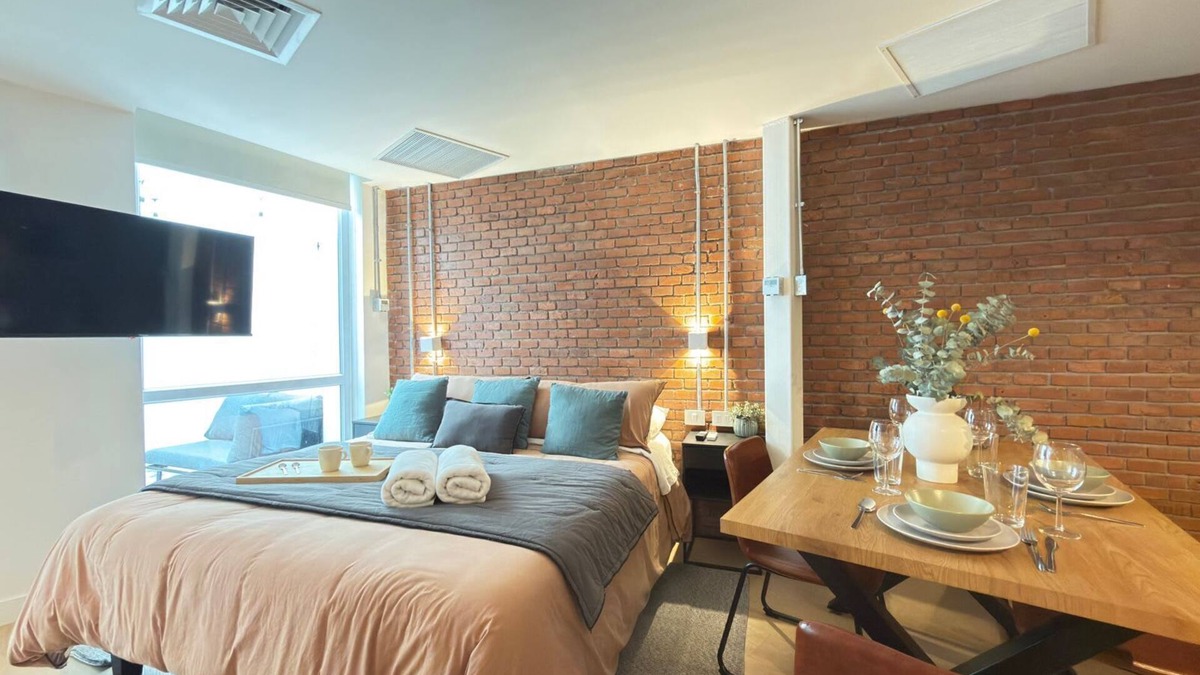 Lastarria Apartment | HOM I Loft Moderno terraza en Lastarria Planta 1