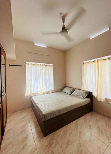 Guruvayur House | Home at Guruvayur 2 AC Room,1 single bed,Kitchen