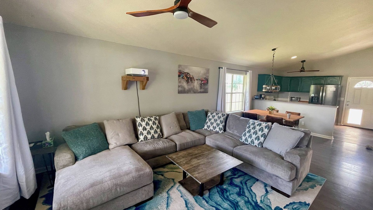 Alpine House | Home Theatre with King Bed