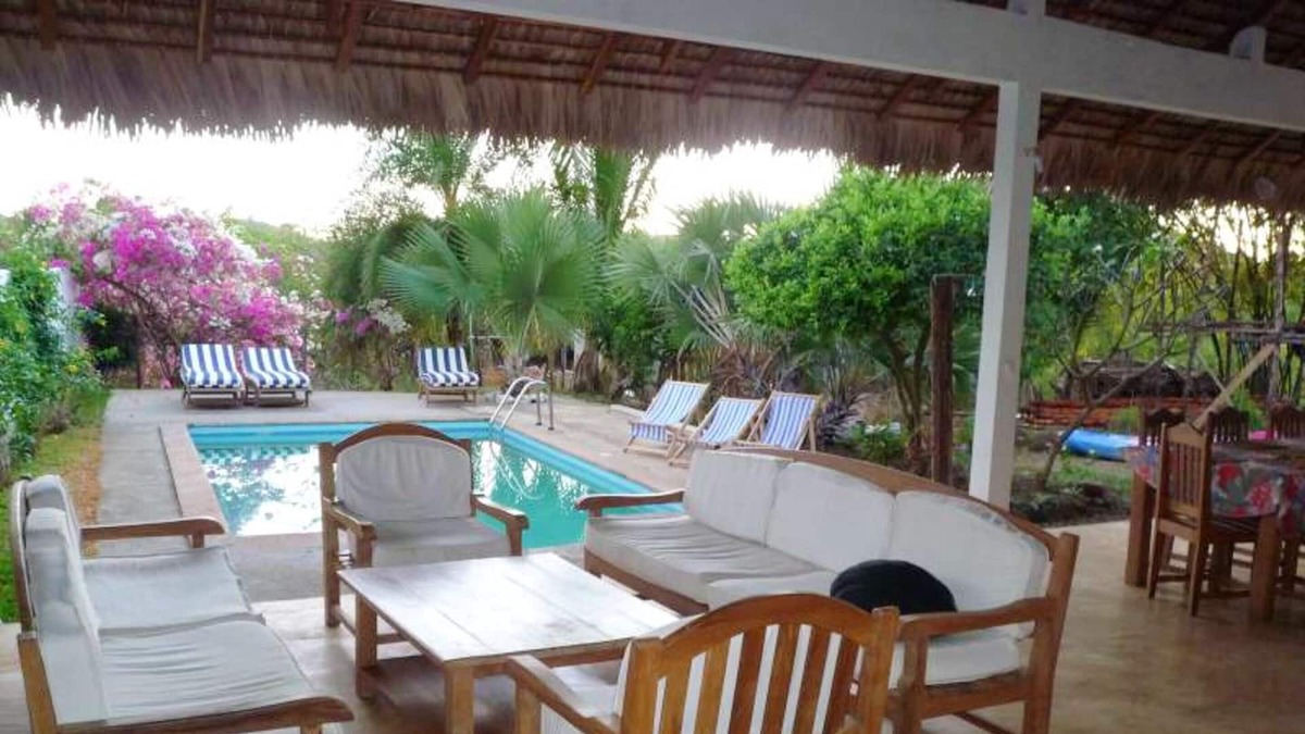 Nosy Be House | Homerez - Bungalow for 4 ppl. with shared pool, sea view and garden at Andilana