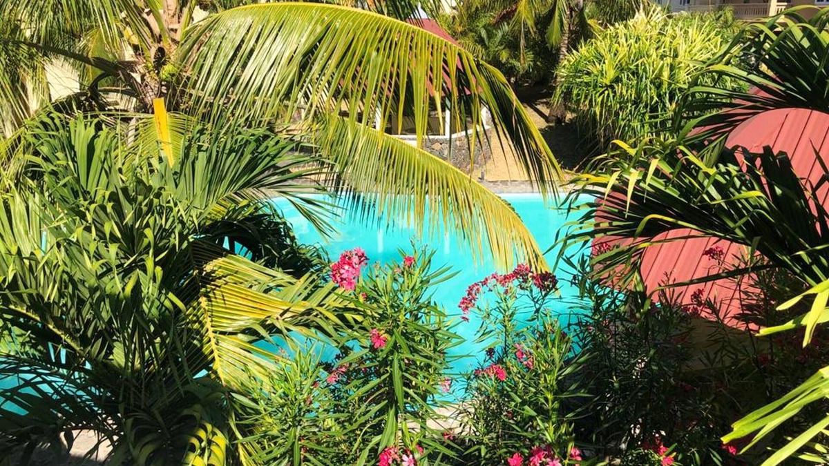 Palmar House | Homerez - Bungalow for 6 ppl. with shared pool, sea view and terrace at Palmar