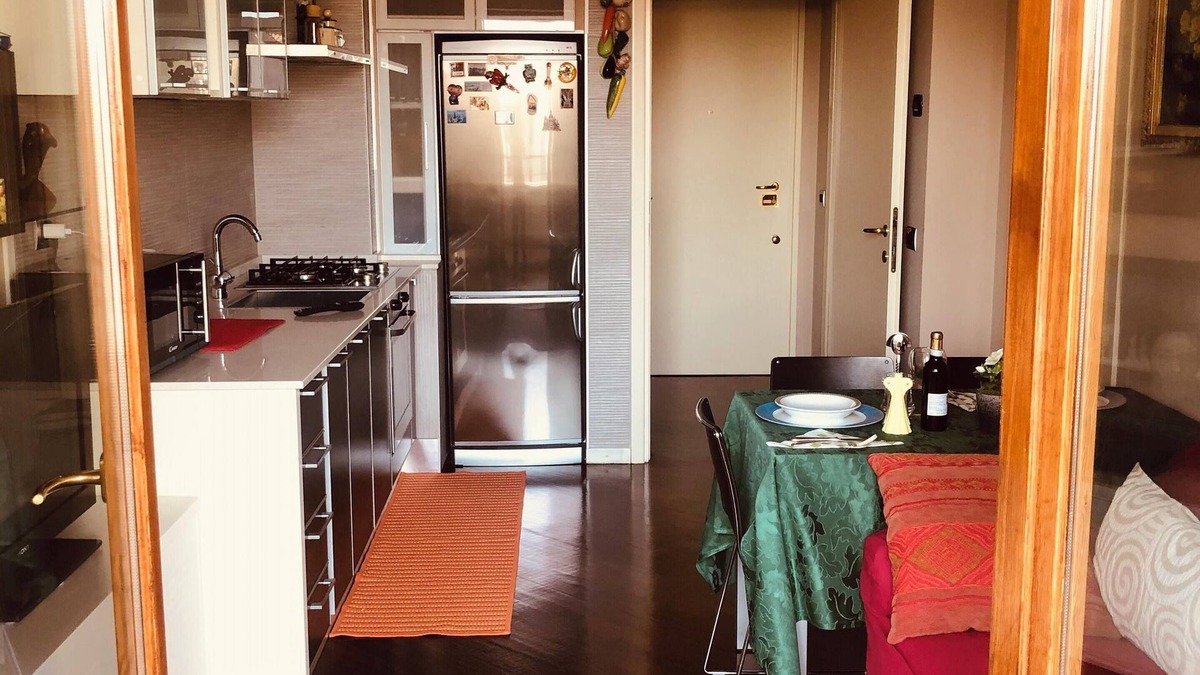 Monza Apartment | Homerez - Elegant Apartment in Monza with Garden View