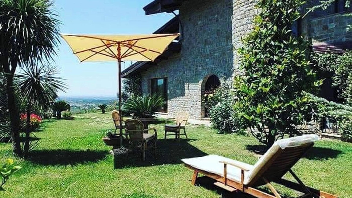 Serre Apartment | Homerez - Elegant Apartment in Serre with Shared Pool and Views