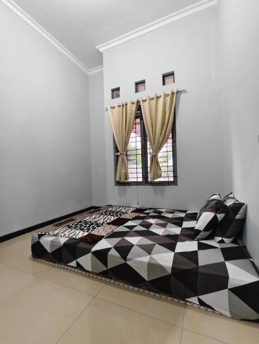 Malang House | Homey Guesthouse Malang Syariah