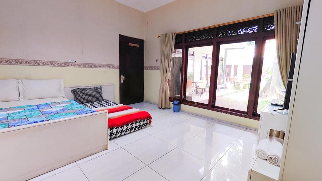 Darmo House | Homey Guesthouse near Sby Zoo Syariah