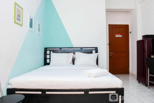 Pondokcina Apartment | Homey Studio Apartment at Margonda Residence 1 By Travelio