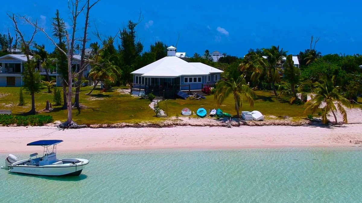 Hope Town House | Hope Town's Top Rental: Beachfront sunsets, AC, free boat dock, & close to town!