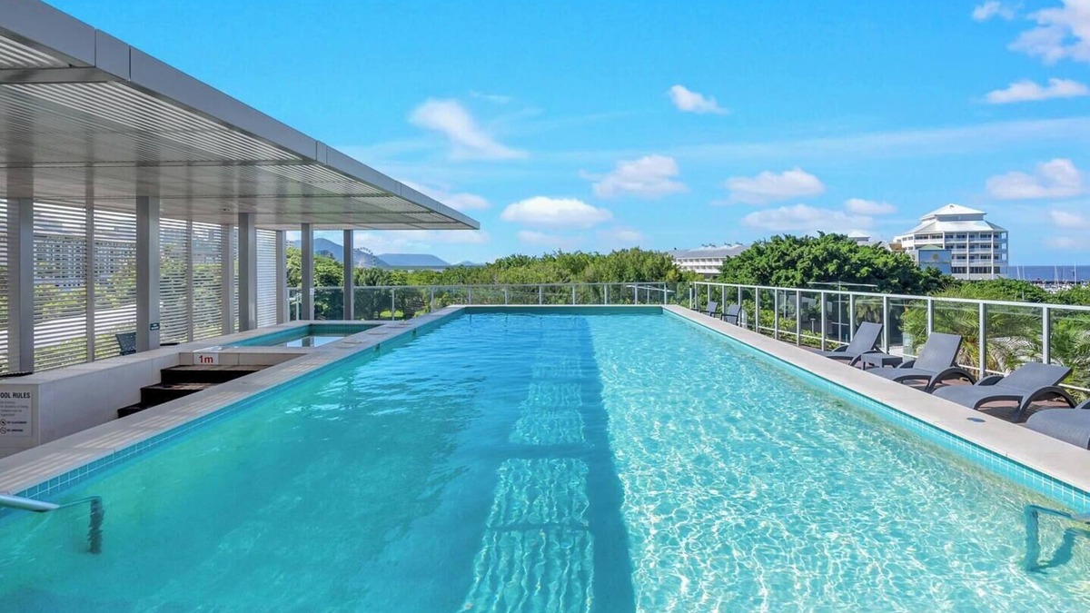 Cairns Central Business District Apartment | Horizons at Harbour Lights Tropical Poolside Flair