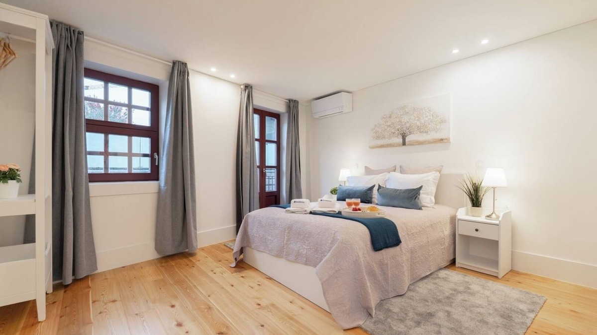 Guimaraes Apartment | HostWise - Sunny Flats w/Balcony