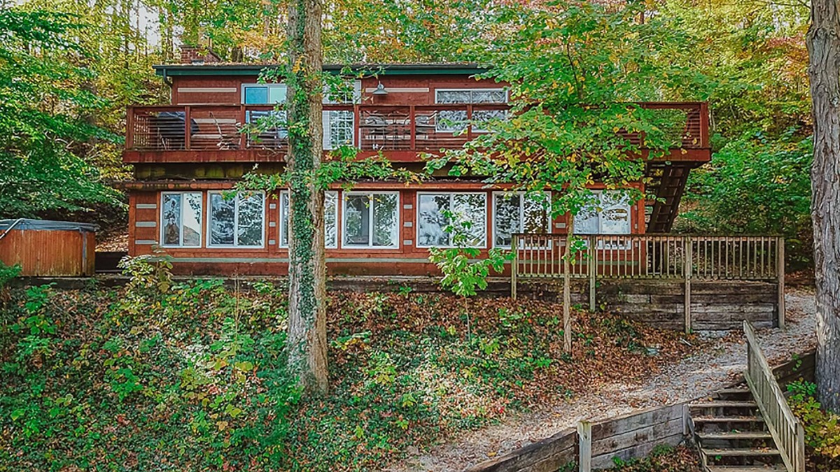 Heltonville Cabin | Hot tub overlooking Lake Monroe. Pet Friendly!