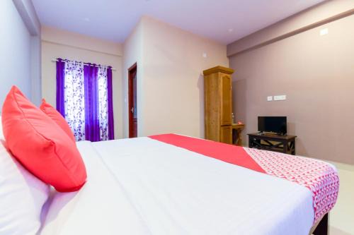 Alappuzha Hotel | Hotel O Amare Highway Residency