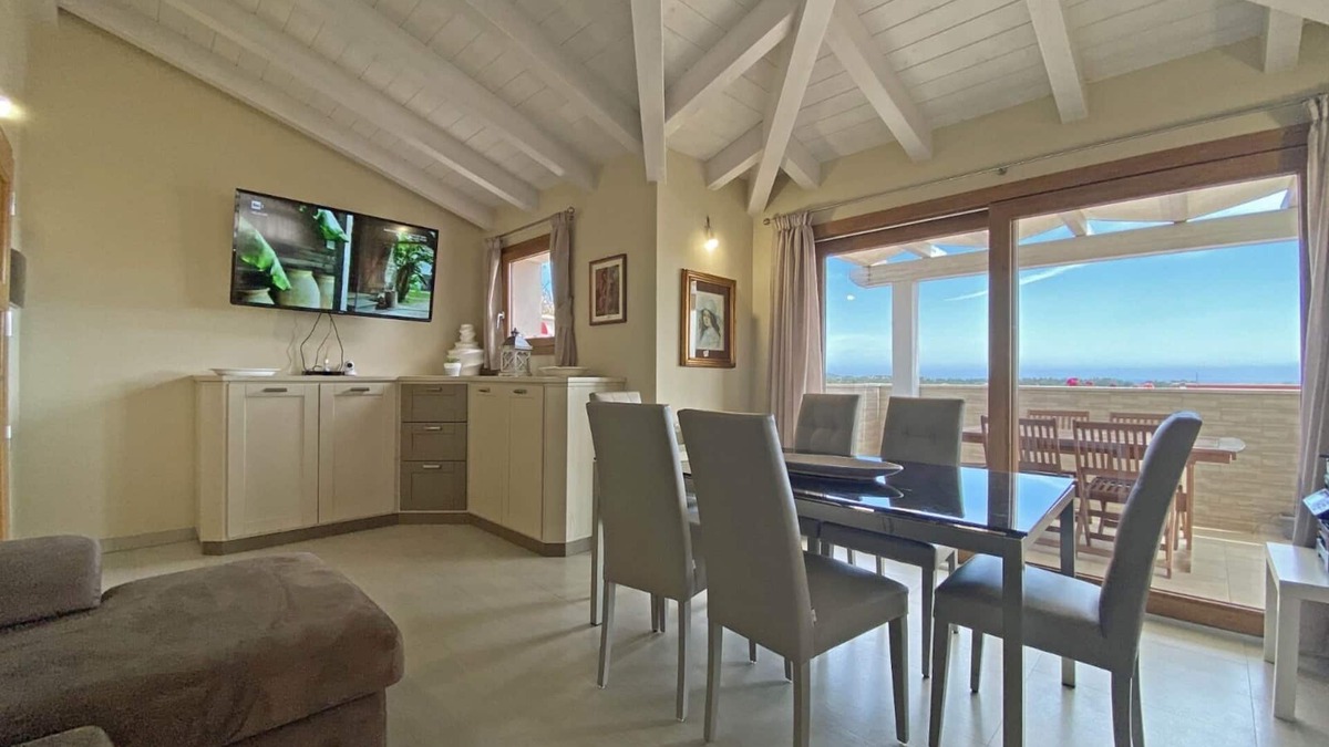 Budoni Apartment | House 41 - penthouse in the historic center crazy sea view - all services nearby