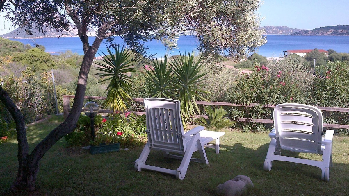 Porto Taverna House | house at 80 mt from the beach, with garden and terrace with a panoramic sea view