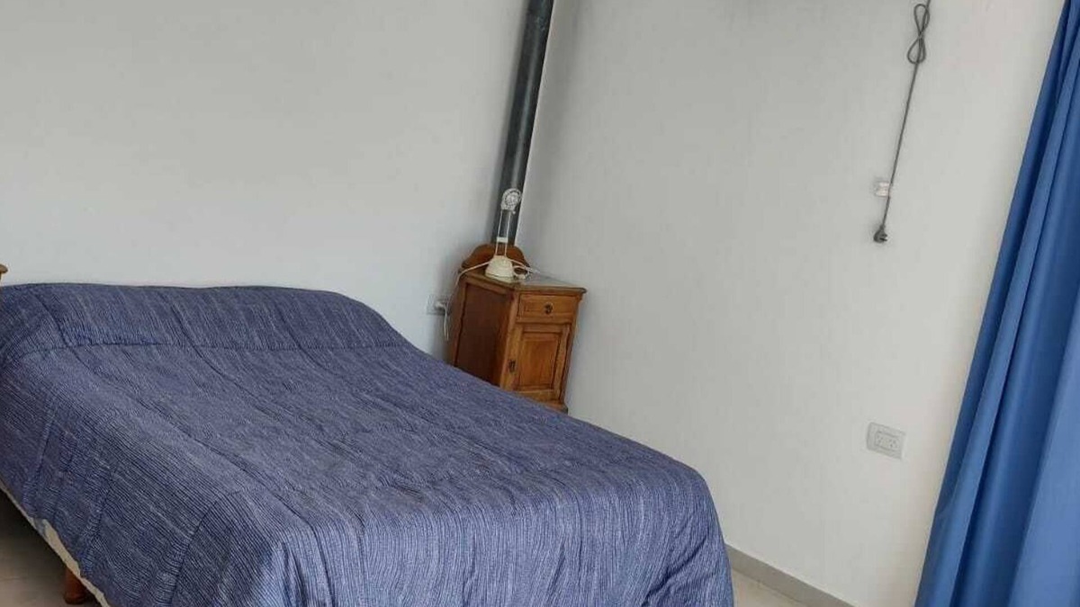 Nueva Cordoba House | House by the lake Puerto del Aguila inbalo 01