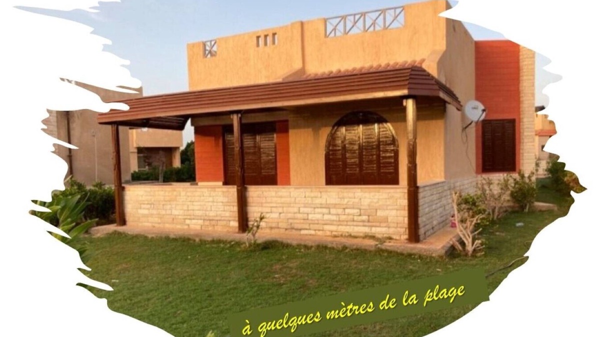 Al-Hammam Ski Chalet | House by the sea,