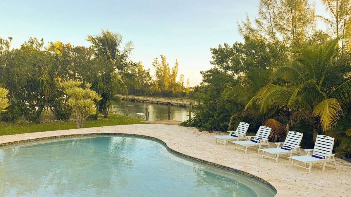 Smith's Point House | House on the canal with pool 10 min walk from beach. Fishing dream come true.