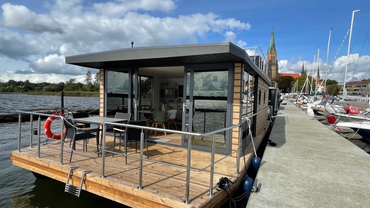 Schleswig Boat Rental | Houseboat Fjord anchorage with bio-sauna and roof terrace in Schleswig