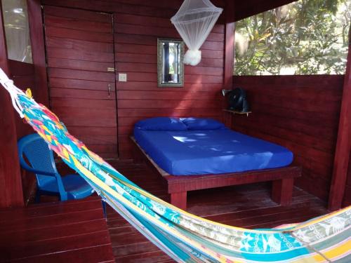Boca Chica Hostel | Howlers Bay Cabin and camping
