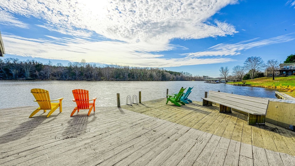 Louisa House | Huge lakefront home with A/C, sunroom, boat ramp, WIFI,game room, deck, & kayaks