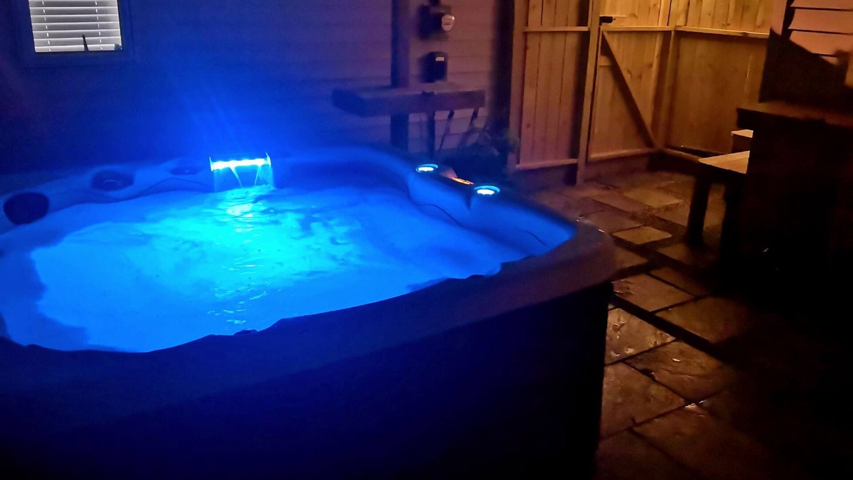 Huntington Apartment | Huntington's Hidden Gem! Private Hot Tub, King Size bed! Perfect Couple Getaway!