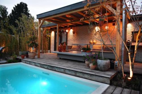 Voorthuizen Ski Chalet | Ibiza Chalet met verwarmde zwembad en wifi