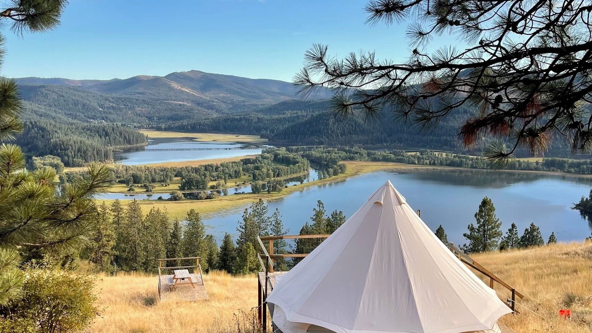 Harrison Cabin | Idaho Getaways Beautiful Glamp tent with lakeview of Lake Coeurdalene & campfire