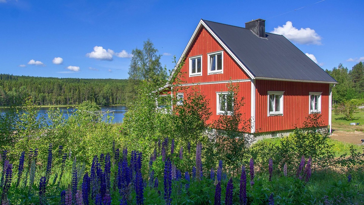 Axland House | Idyllic sunny lakeside location with only 20 m to the private jetty and boat.