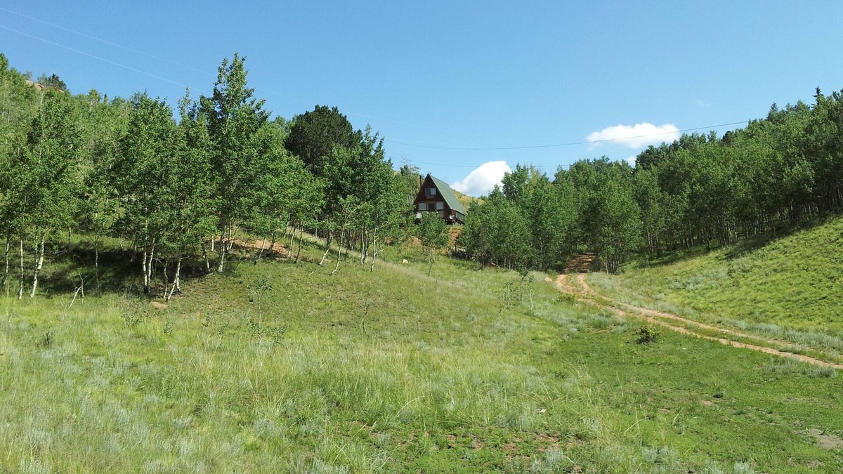 Cripple Creek House | Imagine a romantic couple’s cabin nestled in the heart of the Colorado Rockies