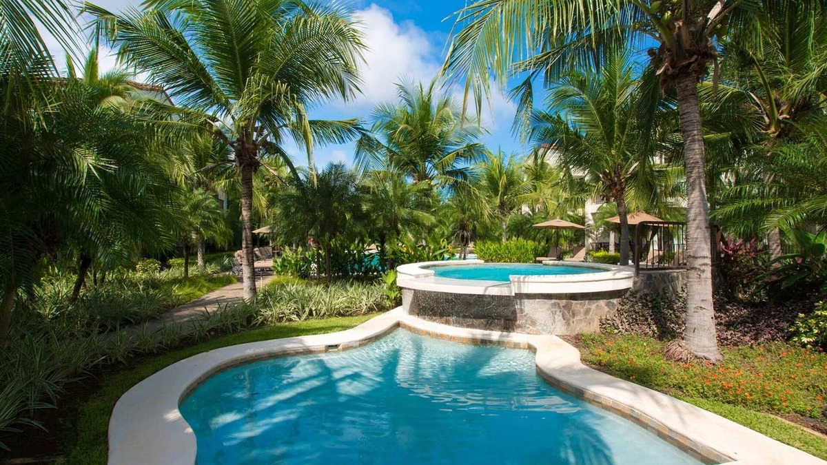 Coco Condo | Impressively Designed 3rd-floor Space Overlooking Pool in Coco