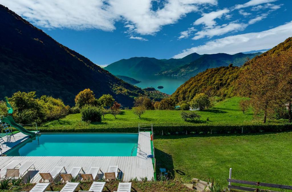 Marone Ski Chalet | In a green and relaxing atmosphere with pool and stunning lake view