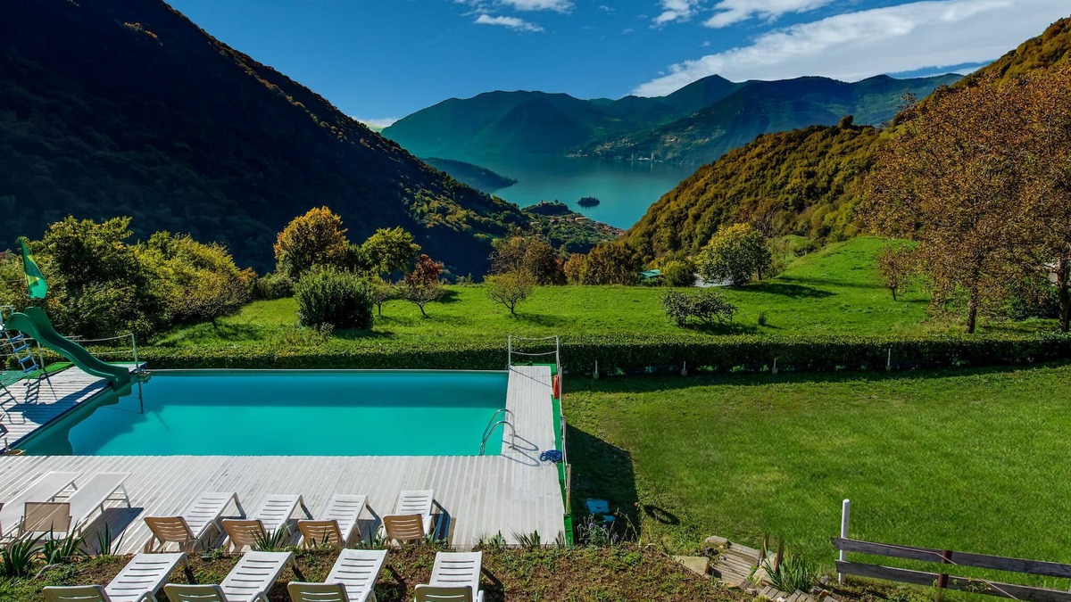 Marone Ski Chalet | In a green and relaxing atmosphere, with pool and stunning lake view.
