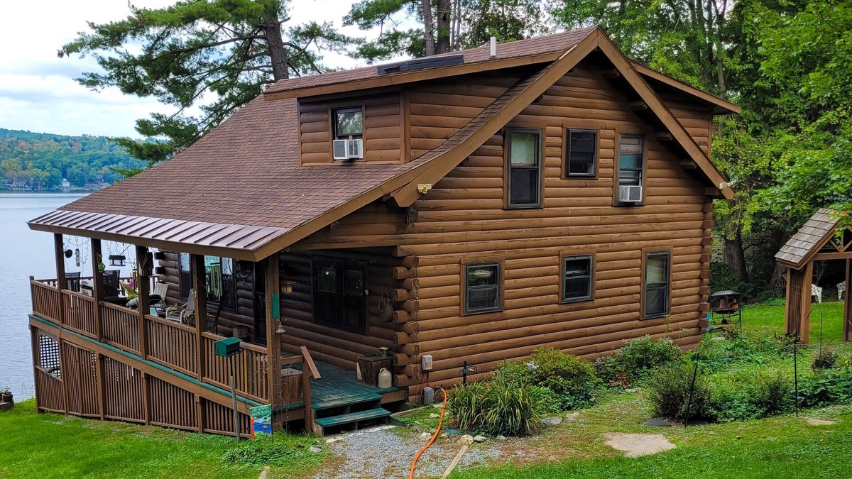 Neshobe Beach House | Incredible lakefront retreat with dock, generous deck, firepit, & amazing views