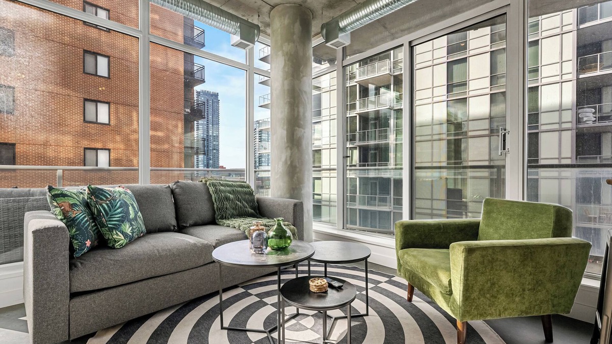 East Village Apartment | Industrial 1BR w Office, Views, AC, XL Patio