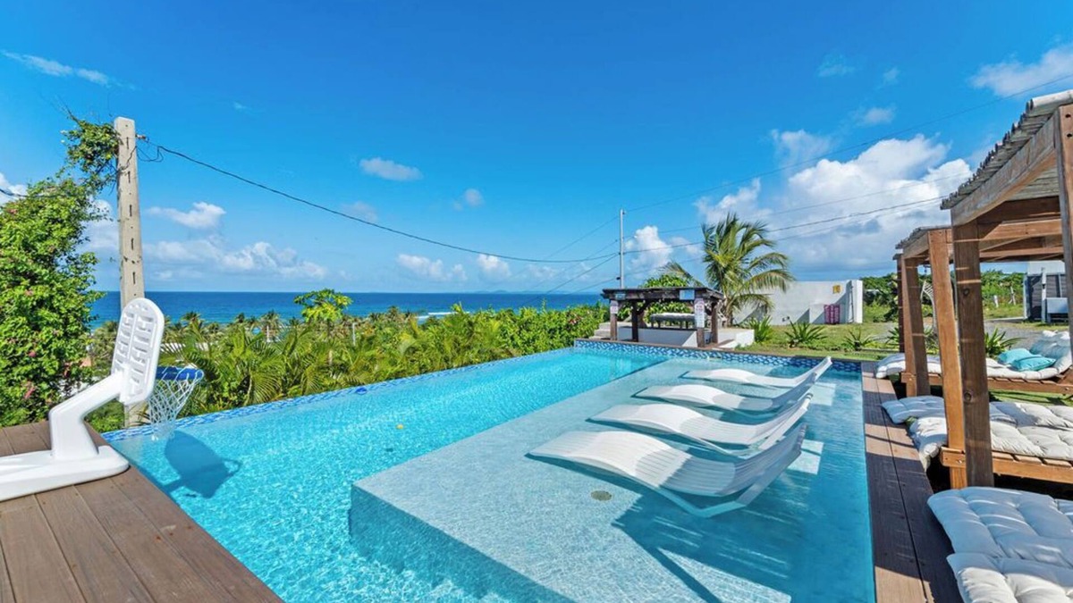 Villa Borinquen House | INFINITY POOL - Ocean View & walk 5 min to beach , 5BR + 3Baths. & Playground!