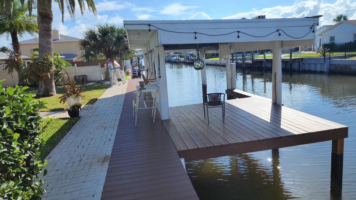 South Daytona House | Intercostal channel house with boat dock and ping-pong table