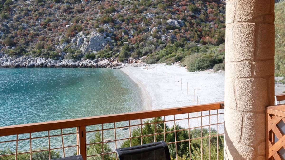 Arkadiko Chorio Apartment | Into The Blue Maisonette: A beautiful stone house on the beach!