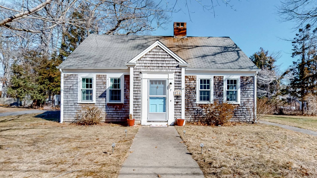 Sandwich House | Inviting abode near the canal with a wood-burning fireplace, grill, & W/D