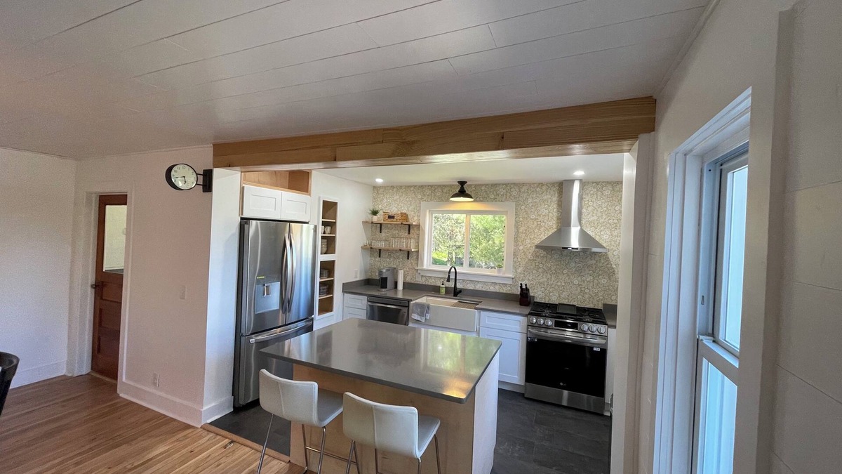 Eveline Township Cottage | Ironton Stone Cottage, walk to Lake Charlevoix beach.